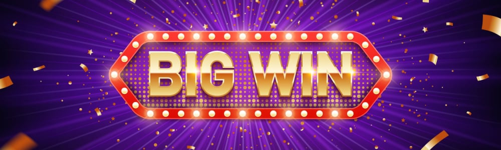 BIG WIN sign in gold and lights on a purple background