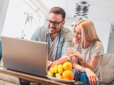 couple having fun on their computer