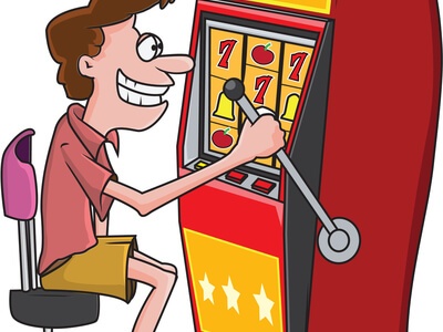 Guy playing on a slot machine  