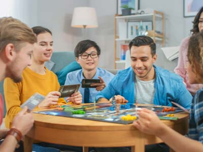 people playing a board game