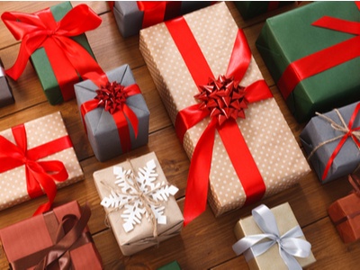 table full of beautifully wrapped gifts